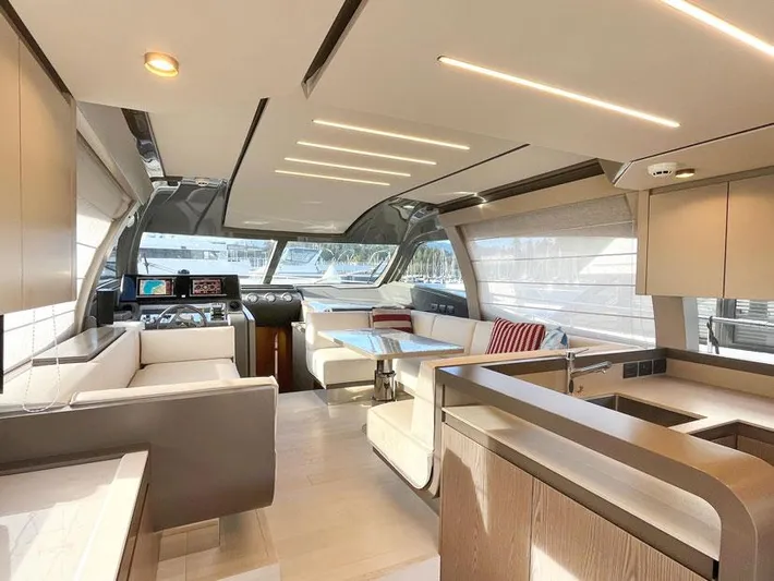  Yacht Photos Pics Luxurious interior of 2018 Ferretti Yachts 550, featuring modern design and spacious seating.