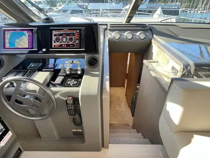  Yacht Photos Pics Helm of 2018 Ferretti Yachts 550 with advanced navigation and control systems.