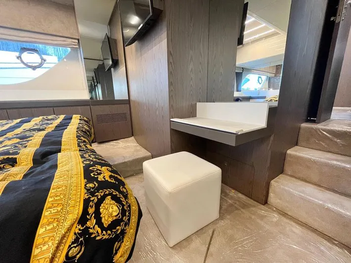  Yacht Photos Pics Luxurious Ferretti Yachts 550 interior with elegant bedding and modern furnishings, 2018 model.