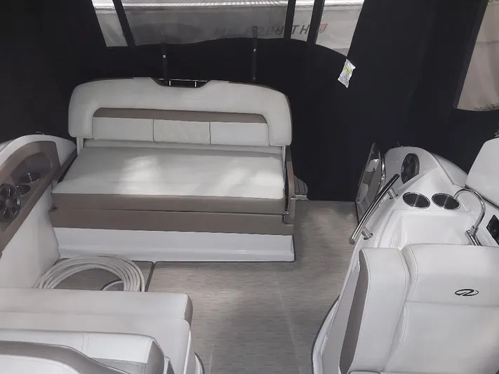 Northern Exposure II Yacht Photos Pics Interior of 2018 Regal 28 Express boat with white seating and modern design.