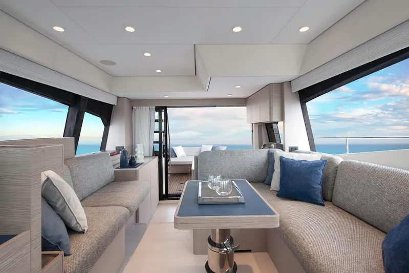  Yacht Photos Pics Luxurious interior of 2022 Ferretti Yachts 500 with ocean view and elegant seating.