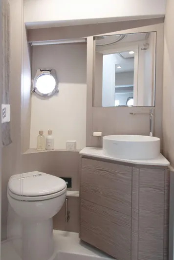  Yacht Photos Pics Modern bathroom in 2022 Ferretti Yachts 500, featuring sleek fixtures and elegant design.