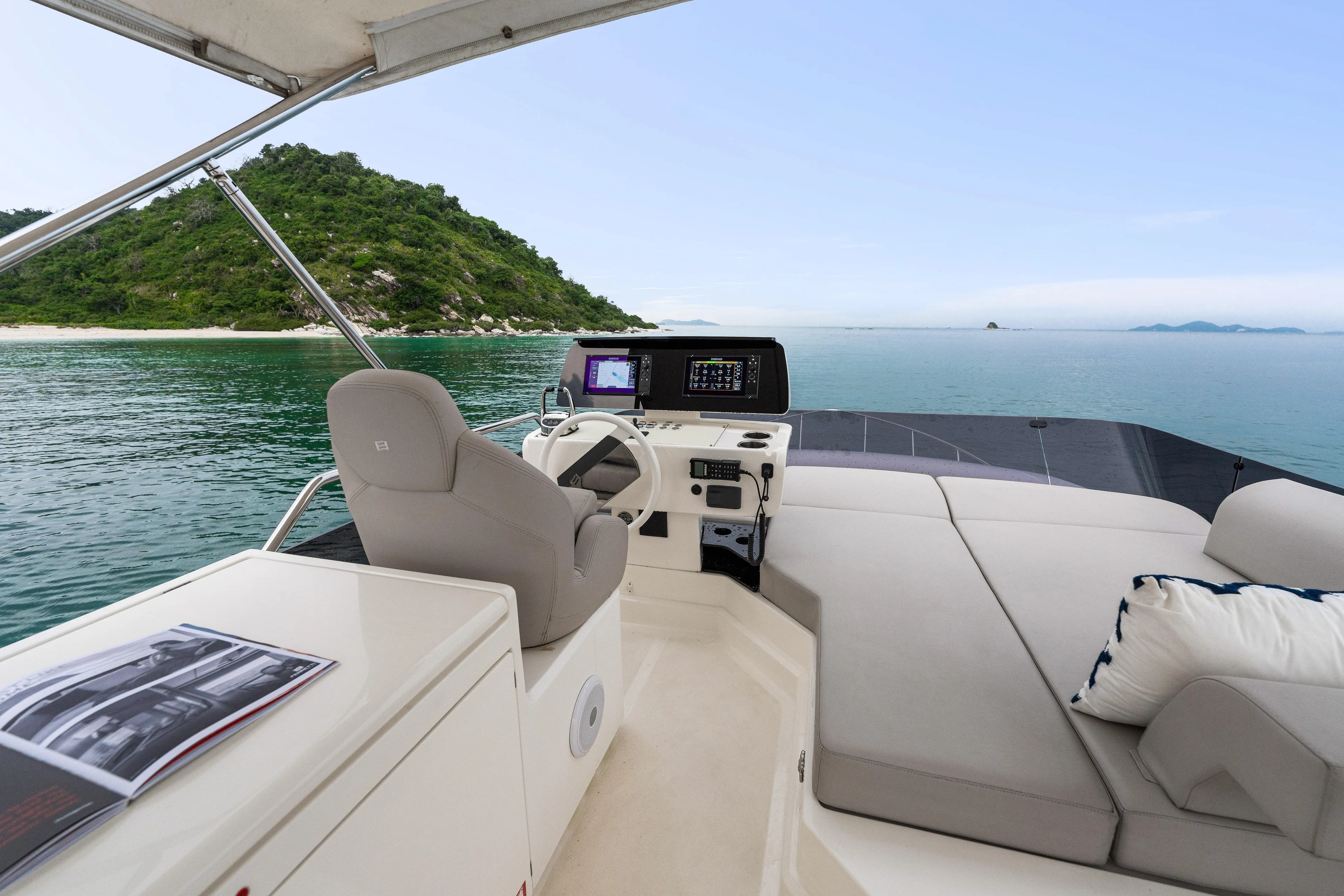 Yacht Photos Pics Luxurious 2022 Ferretti Yachts 500 interior with ocean view and modern helm station.