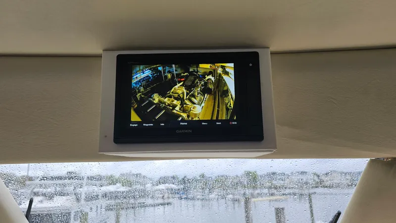  Yacht Photos Pics Display screen on 2000 Ocean Yachts 70 Super Sport, showing engine room view.
