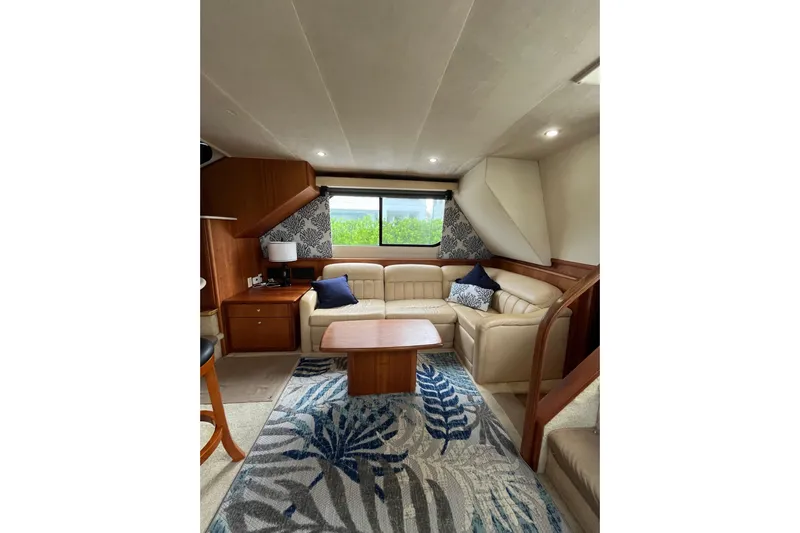 Everyday Yacht Photos Pics Luxurious interior of 2003 Silverton 453 Motor Yacht with elegant seating and decor.