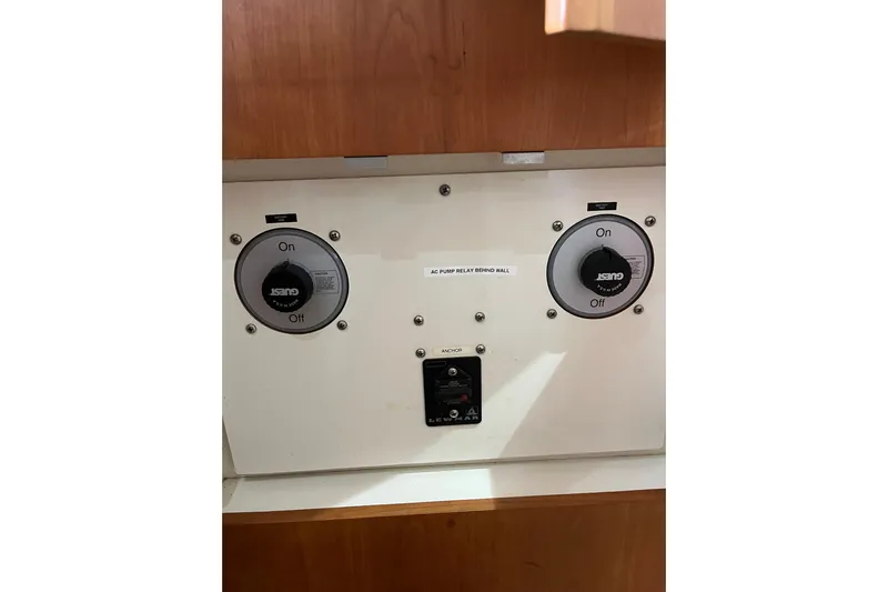 Everyday Yacht Photos Pics Control panel of a 2003 Silverton 453 Motor Yacht with switches and labels.