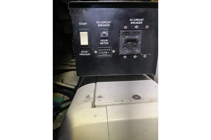 Everyday Yacht Photos Pics Control panel of a 2003 Silverton 453 Motor Yacht with circuit breakers and hour meter.