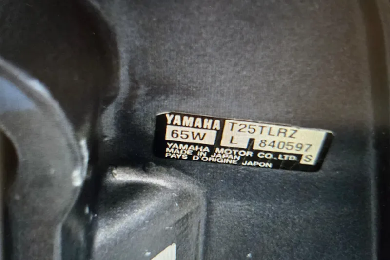 Everyday Yacht Photos Pics Yamaha motor label on 2003 Silverton 453 Motor Yacht, model T25TLRZ, 65W, made in Japan.