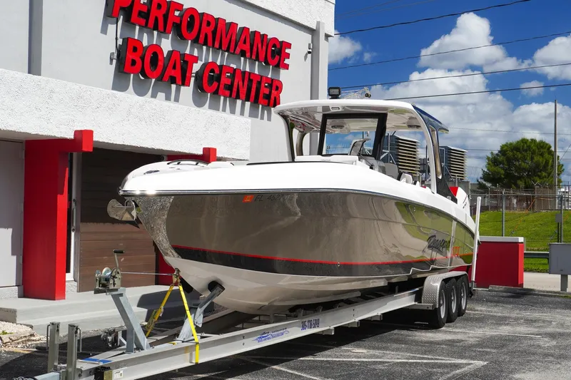  Yacht Photos Pics 2023 Renegade 38 GTS Open boat on trailer at Performance Boat Center.