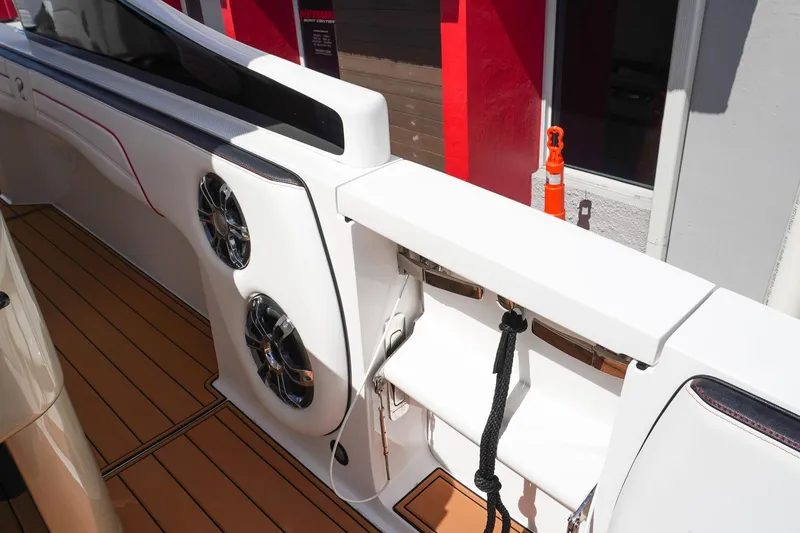  Yacht Photos Pics 2023 Renegade 38 GTS Open boat interior with speakers and sleek design.