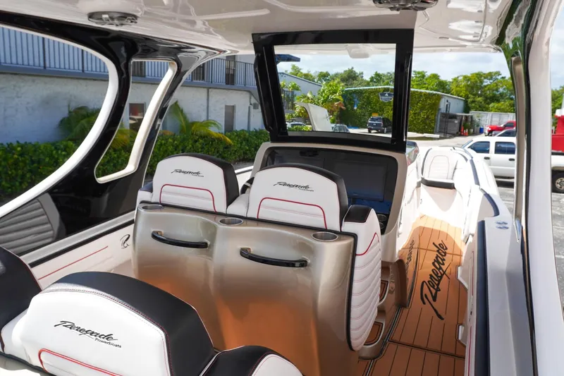  Yacht Photos Pics 2023 Renegade 38 GTS Open boat interior with sleek seating and modern design.