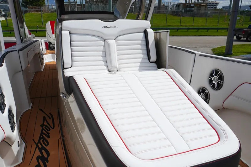  Yacht Photos Pics 2023 Renegade 38 GTS Open boat with luxurious white seating and sleek design.