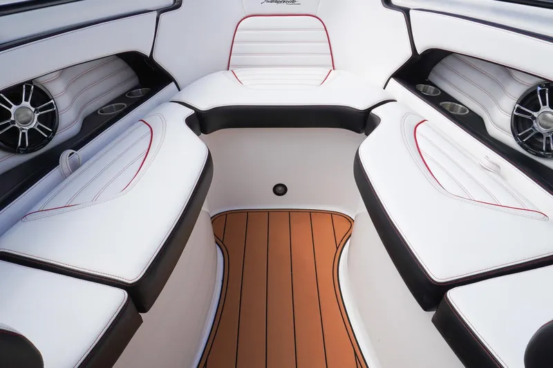  Yacht Photos Pics Luxurious interior of 2023 Renegade 38 GTS Open boat with white seating and wood flooring.
