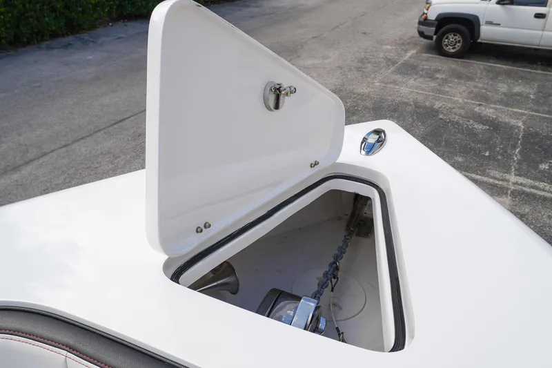  Yacht Photos Pics Open anchor hatch on 2023 Renegade 38 GTS Open boat, showcasing chain storage.