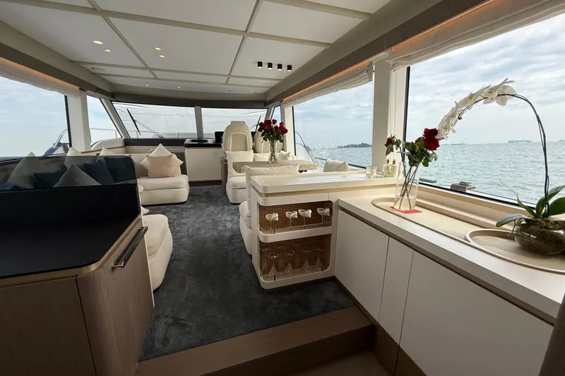  Yacht Photos Pics Luxurious interior of 2024 Azimut Magellano 60 yacht with elegant seating and ocean view.