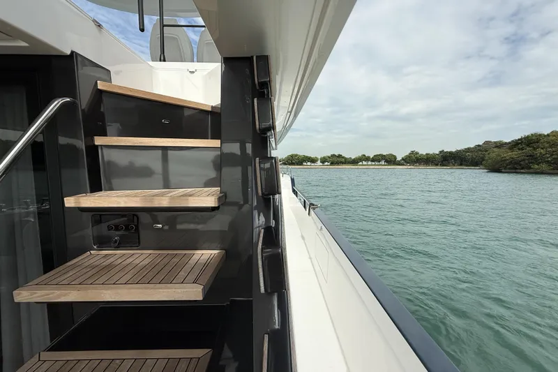  Yacht Photos Pics Staircase on 2024 Azimut Magellano 60 yacht with scenic water view.