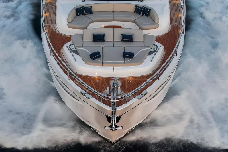  Yacht Photos Pics Luxurious 2025 Princess Y72 yacht cruising with elegant deck seating and sleek design.