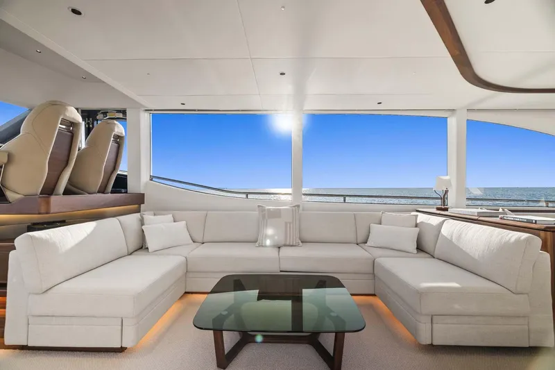  Yacht Photos Pics Luxurious interior of 2025 Princess Y72 yacht with elegant seating and ocean view.
