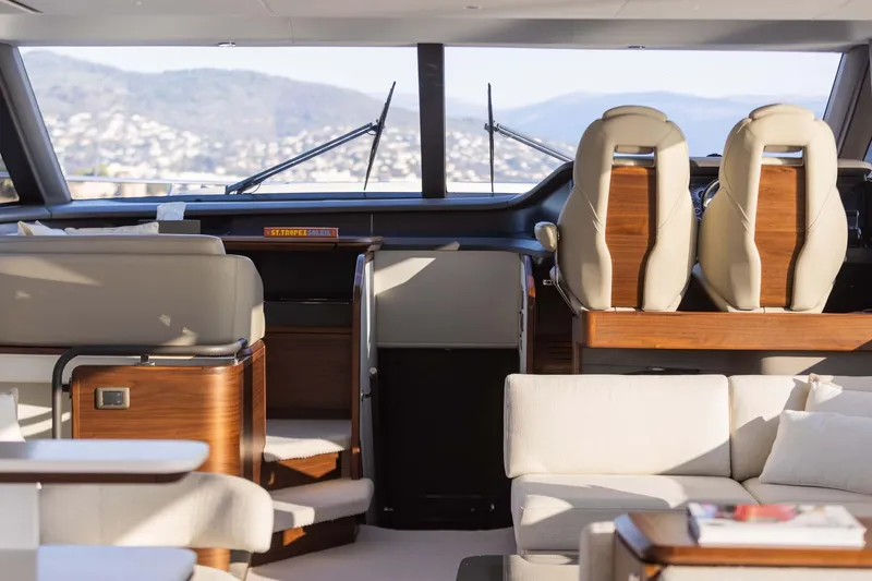  Yacht Photos Pics Luxurious interior of 2025 Princess Y72 yacht with elegant seating and panoramic views.