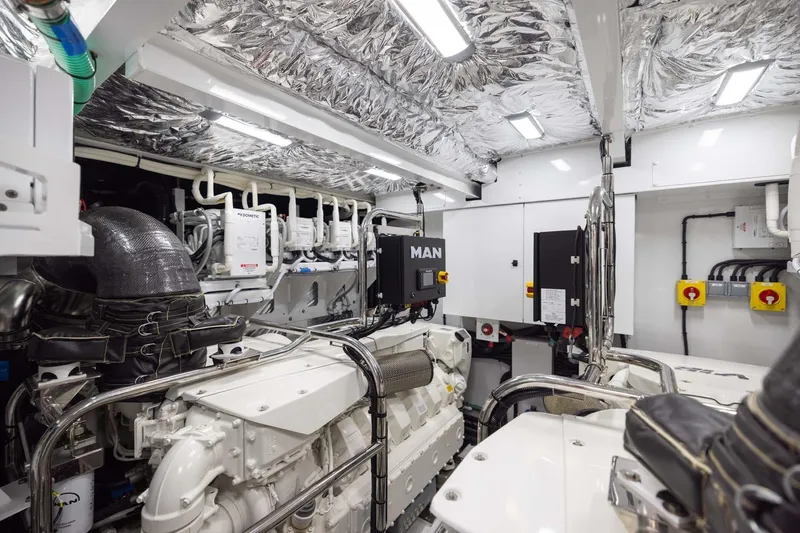  Yacht Photos Pics Engine room of 2025 Princess Y72 yacht, featuring advanced MAN engines and modern equipment.
