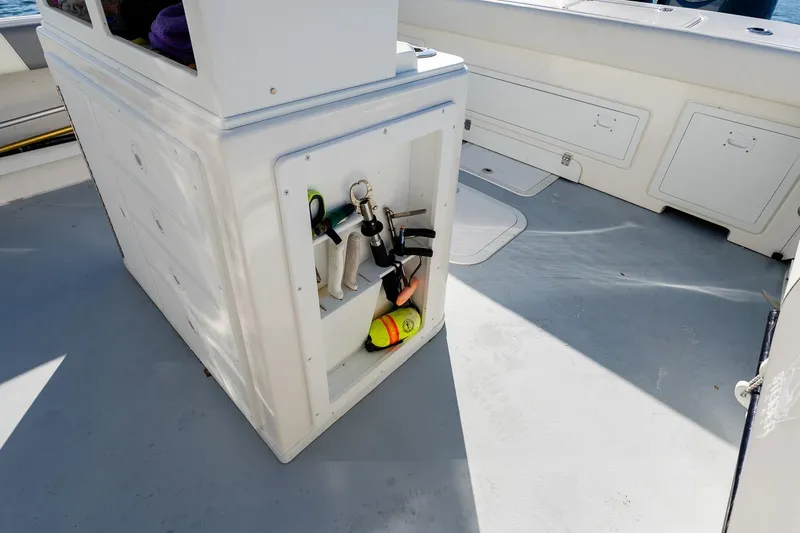  Yacht Photos Pics 2024 Steiger Craft 31 Fisherman boat deck with storage and fishing gear.