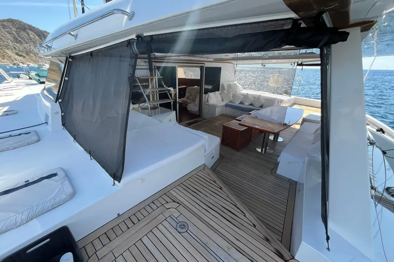 Sunreef 60 Yacht Photos Pics Luxurious Sunreef 60 yacht interior with spacious deck, comfortable seating, and ocean view.