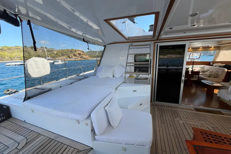 Sunreef 60 Yacht Photos Pics Luxurious Sunreef 60 yacht interior, featuring spacious deck and comfortable seating, 2005 model.