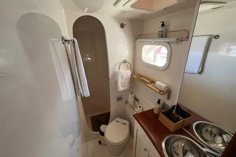 Sunreef 60 Yacht Photos Pics Luxurious bathroom in a 2005 Sunreef 60 yacht, featuring modern amenities and elegant design.