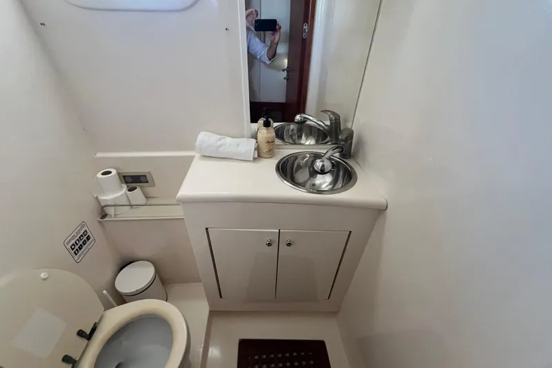 Sunreef 60 Yacht Photos Pics Bathroom interior of a 2005 Sunreef 60 yacht, featuring a sink and toilet.