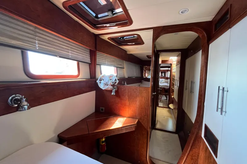 Sunreef 60 Yacht Photos Pics Luxurious interior of 2005 Sunreef 60 yacht with wood finishes and modern design.