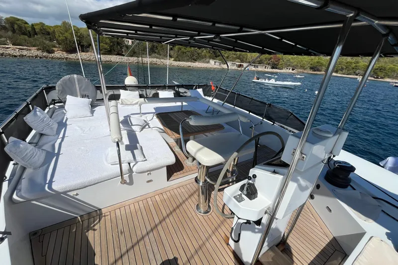 Sunreef 60 Yacht Photos Pics Luxurious Sunreef 60 yacht deck with seating, sunbeds, and ocean view, 2005 model.