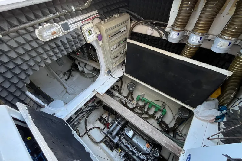 Sunreef 60 Yacht Photos Pics Engine room of a 2005 Sunreef 60 yacht, featuring mechanical components and control panels.