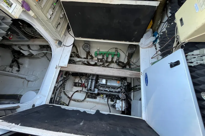 Sunreef 60 Yacht Photos Pics Engine room of a 2005 Sunreef 60 yacht, showcasing mechanical components and wiring.