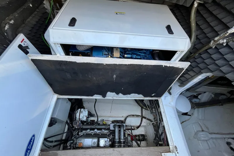 Sunreef 60 Yacht Photos Pics Engine compartment of a 2005 Sunreef 60 yacht, showcasing mechanical components and insulation.