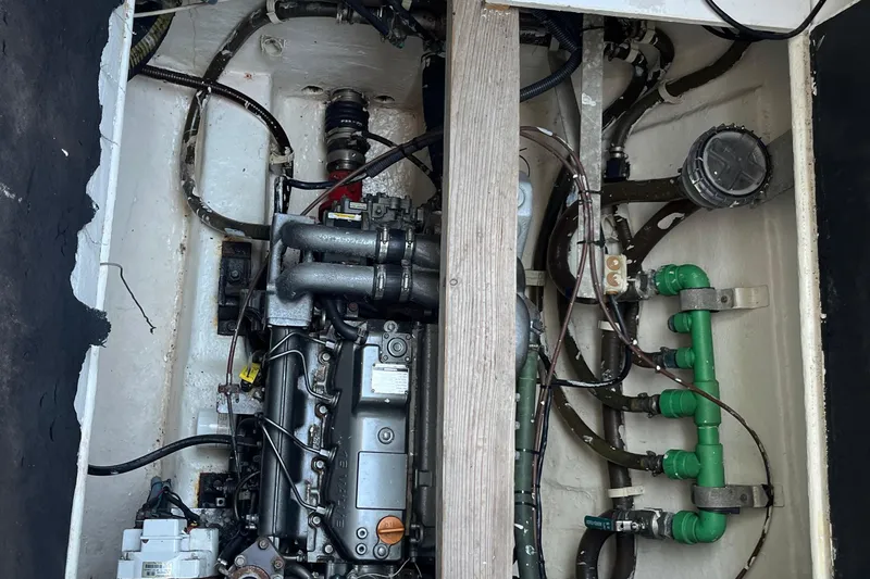 Sunreef 60 Yacht Photos Pics Engine compartment of a 2005 Sunreef 60 yacht, showcasing mechanical components and piping.