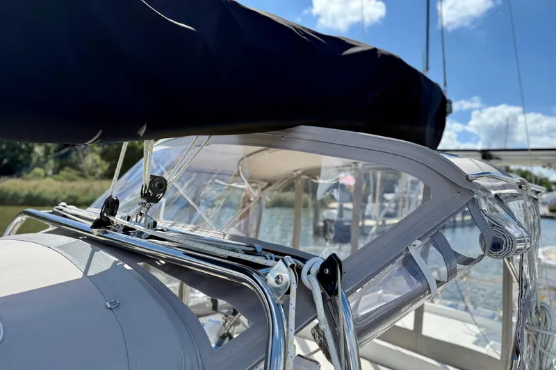 Su Ching Yacht Photos Pics 1984 Tayana 55 sailboat cockpit with clear canopy and rigging details.