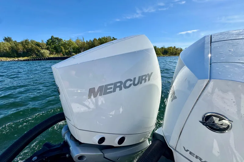  Yacht Photos Pics 2023 Monterey 305SS Super Sport with Mercury engines on a scenic lake.