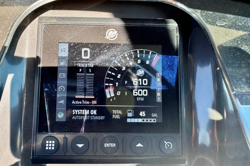  Yacht Photos Pics Dashboard display of 2023 Monterey 305SS Super Sport showing speed, RPM, and fuel level.