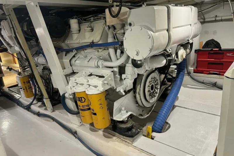  Yacht Photos Pics Engine room of a 1992 Blackwell Custom Carolina boat with visible CAT components.