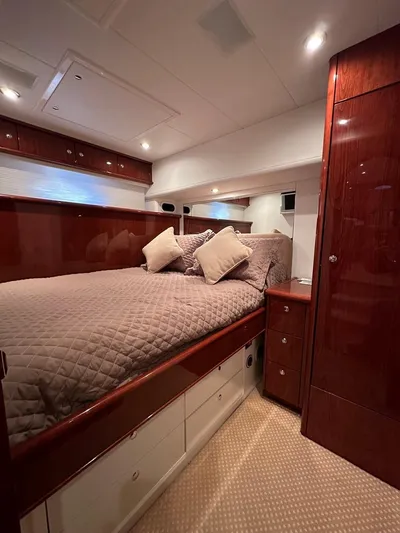  Yacht Photos Pics Luxurious cabin interior of 2006 Neptunus 55 Royale yacht with plush bedding.