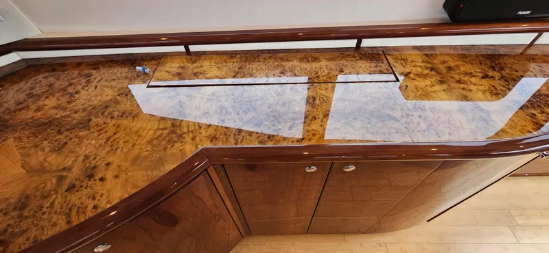  Yacht Photos Pics Luxurious wood finish interior of 2006 Neptunus 55 Royale yacht.