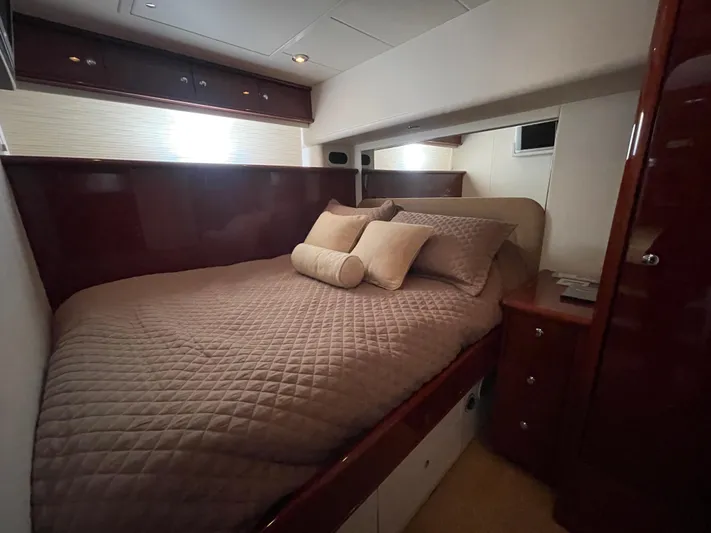  Yacht Photos Pics Luxurious bedroom interior of 2006 Neptunus 55 Royale yacht with elegant bedding.