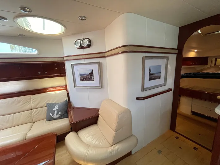  Yacht Photos Pics Luxurious interior of 2006 Neptunus 55 Royale yacht with elegant seating and decor.