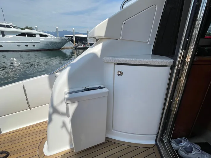  Yacht Photos Pics 2006 Neptunus 55 Royale yacht interior with sleek design and waterfront view.