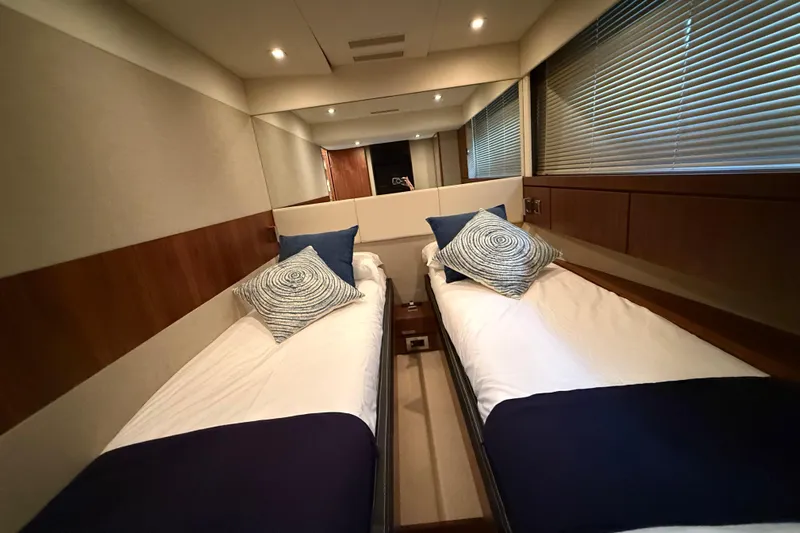 Marckeric Yacht Photos Pics Luxurious twin cabin interior on 2012 Fairline Squadron 58 yacht.