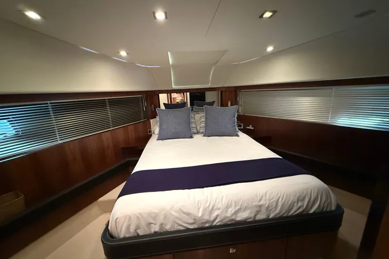 Marckeric Yacht Photos Pics Luxurious cabin interior of 2012 Fairline Squadron 58 yacht with elegant bedding.