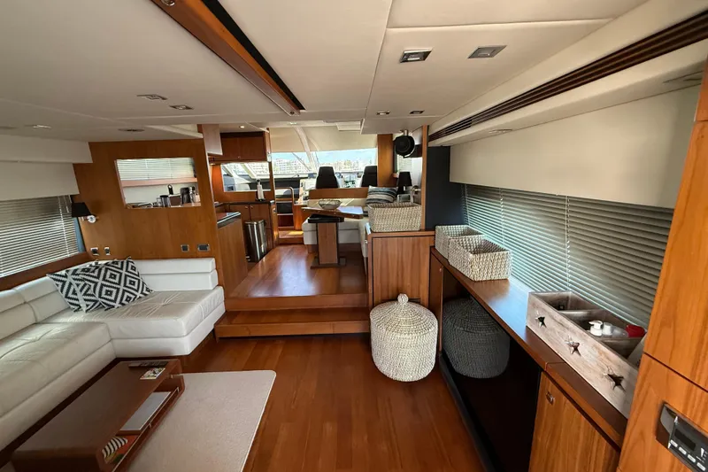 Marckeric Yacht Photos Pics Luxurious interior of 2012 Fairline Squadron 58 yacht with modern furnishings and wood accents.