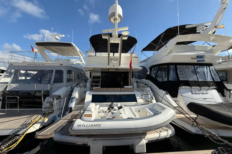 Marckeric Yacht Photos Pics Luxury yachts docked, featuring a 2012 Fairline Squadron 58 with a tender boat.