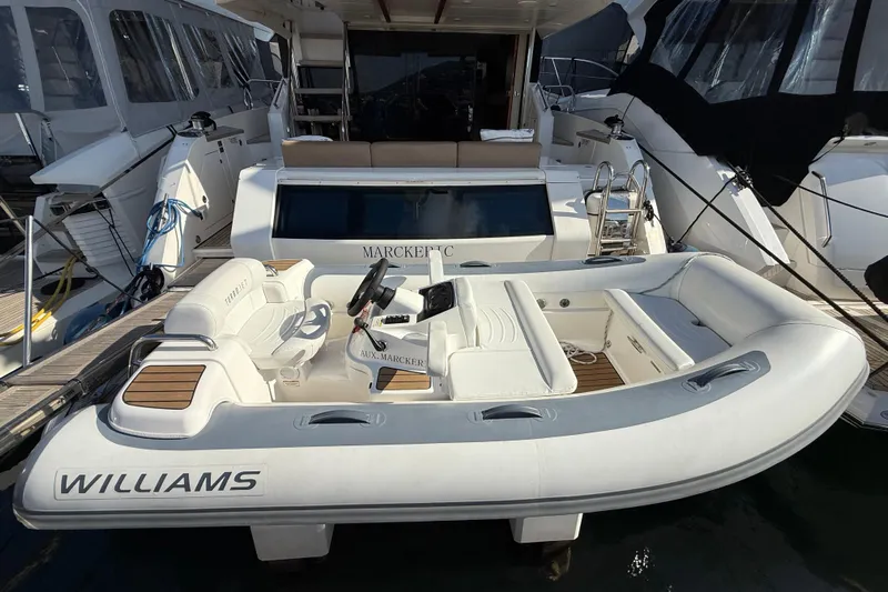 Marckeric Yacht Photos Pics 2012 Fairline Squadron 58 yacht with Williams tender docked at marina.