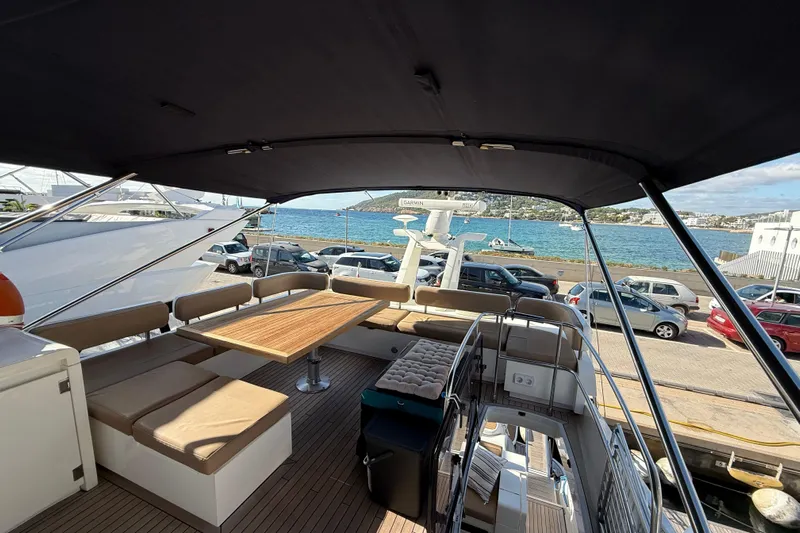 Marckeric Yacht Photos Pics Luxurious 2012 Fairline Squadron 58 yacht with spacious deck and waterfront view.